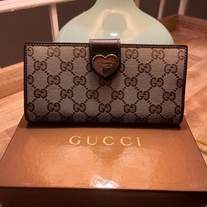 Gucci monogram heart snap wallet long